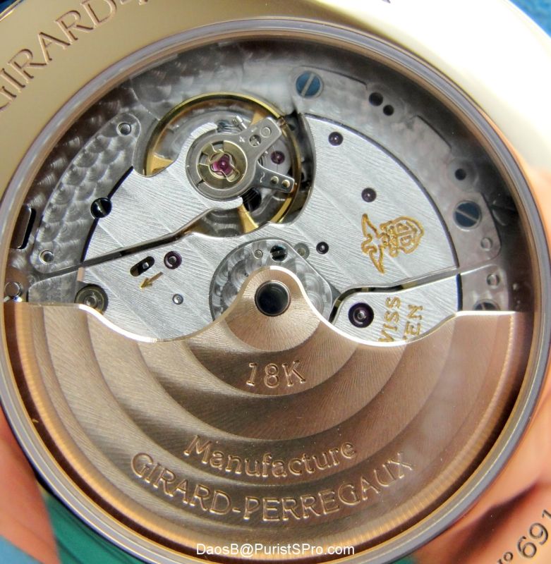 The 18K rose gold rotor of the caliber GP033M0.