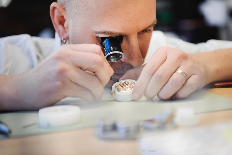 Watchmaker Mathieu Bergeon working on a three bridges tourbillon for GP.