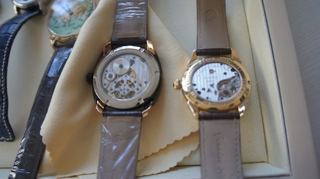 Tourbillon movement on the left; SB18 handwinding movement on the right