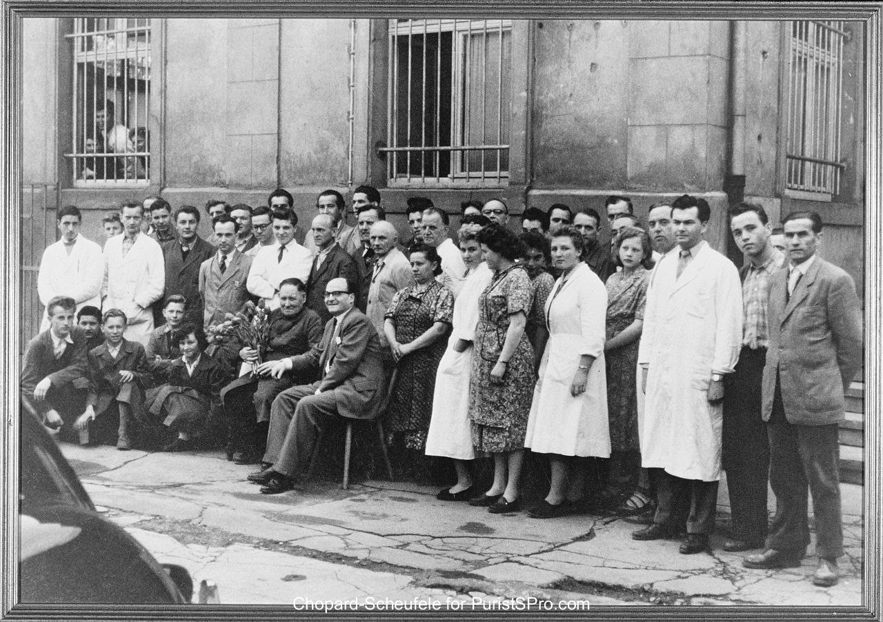 Karl Scheufele II seated and Karl Scheufele III (white coat) 3rd from Right