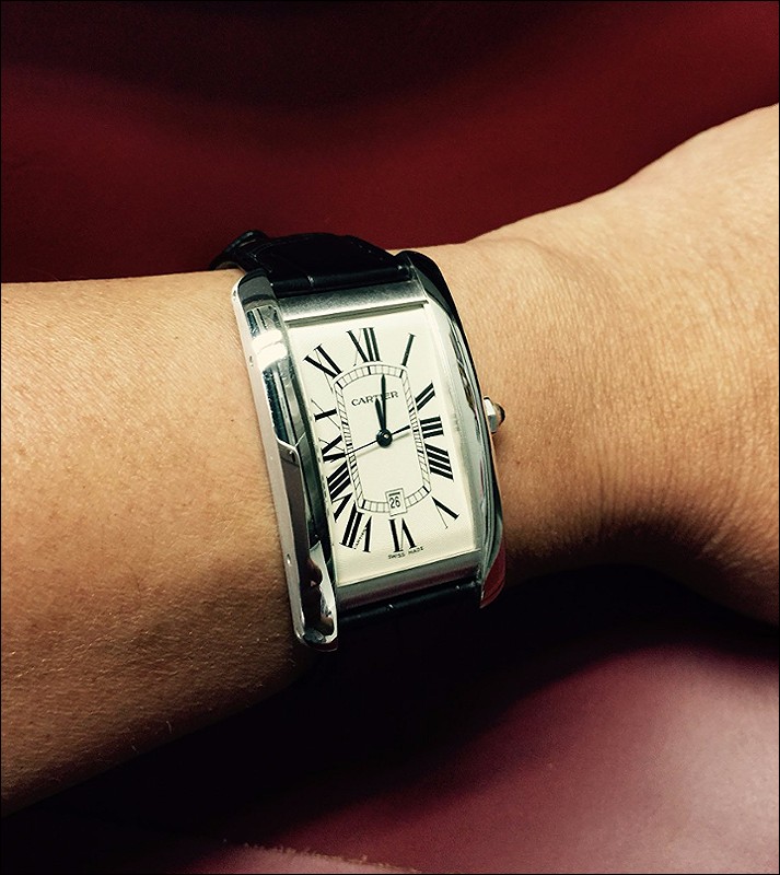 cartier tank americaine on wrist