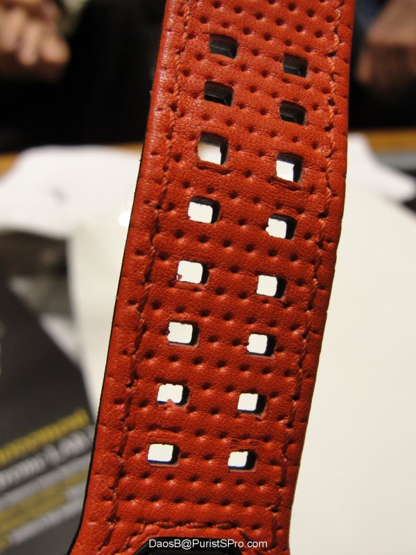 The buckle has two prongs which meet up with these holes in the strap.