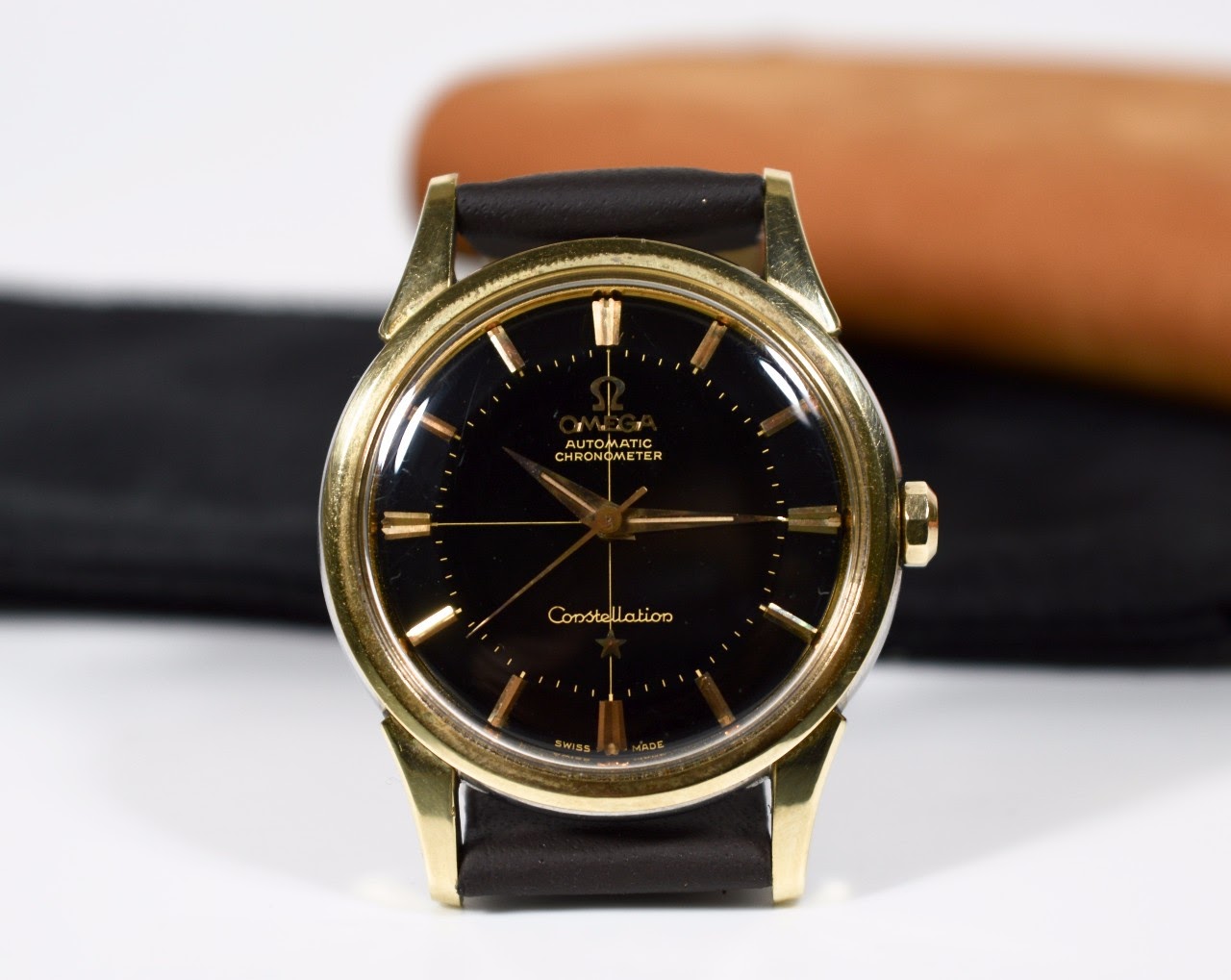 omega black and gold