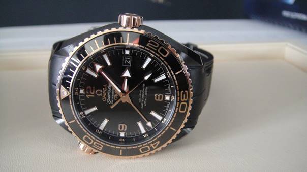 omega deep black gold