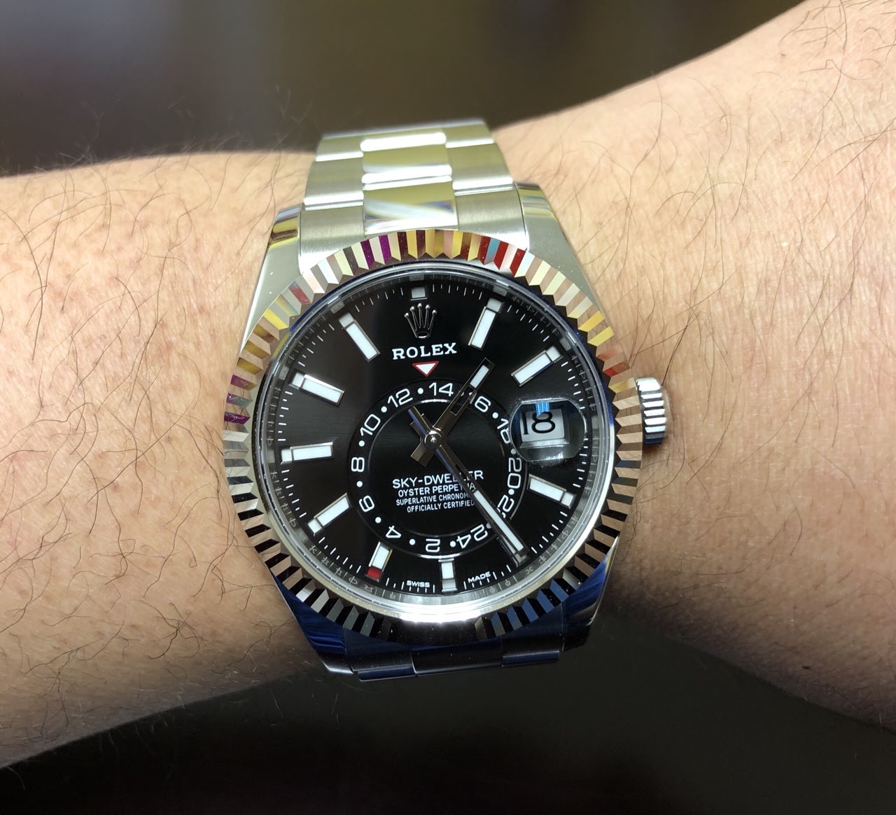 sky dweller on wrist