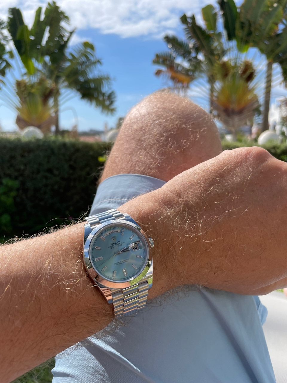 Rolex - ice blue dial matches my swimming trunks :-)