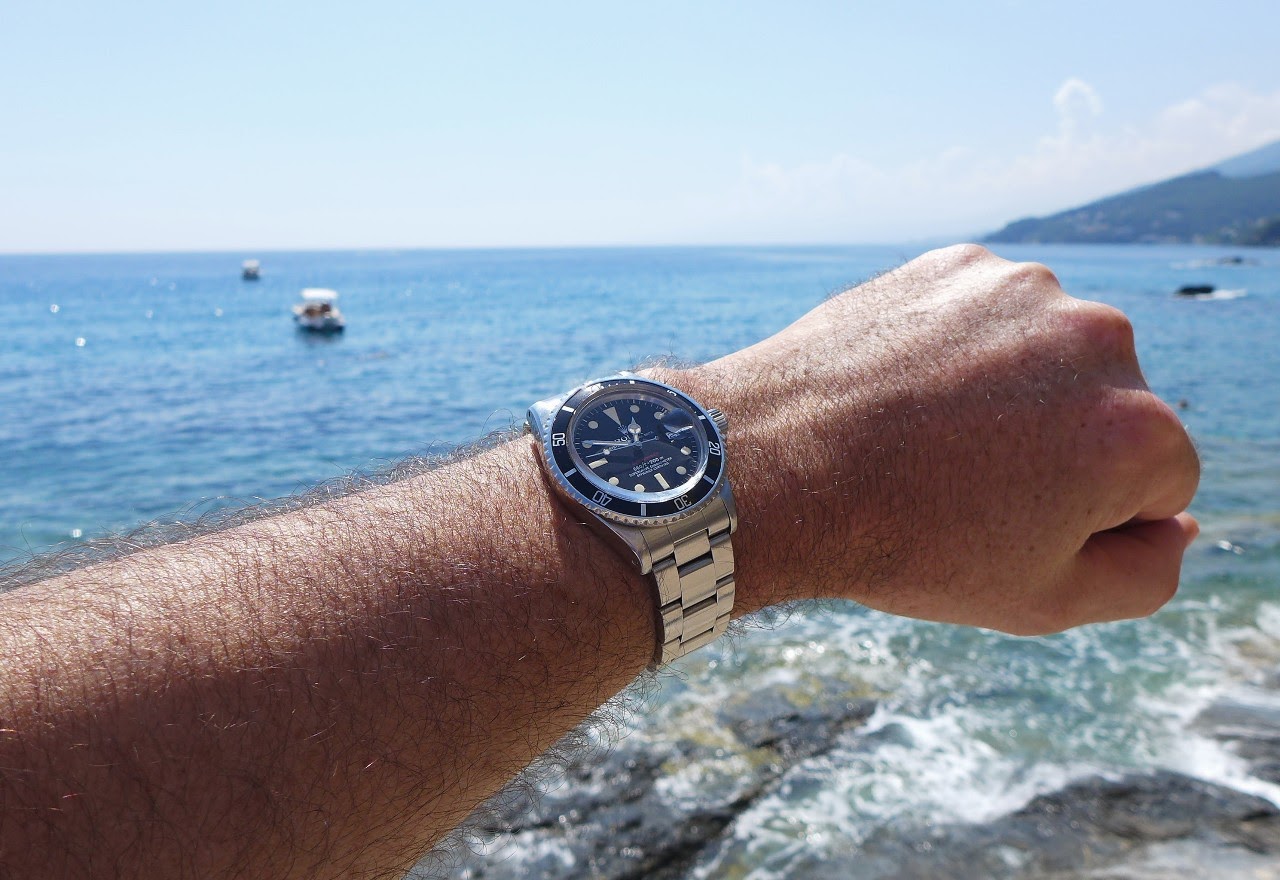 rolex submariner on wrist