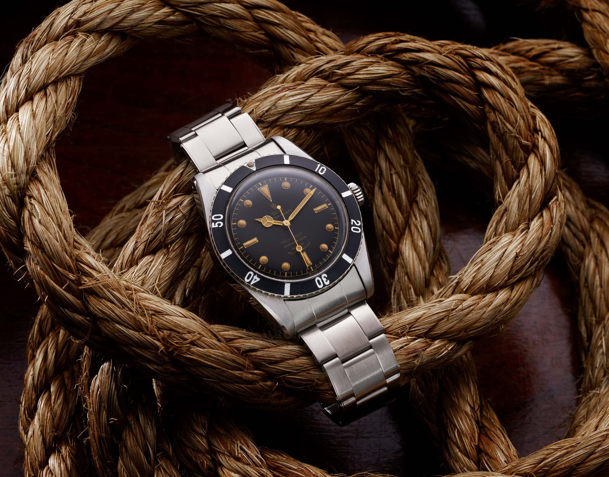 Tudor black store bay rolex submariner