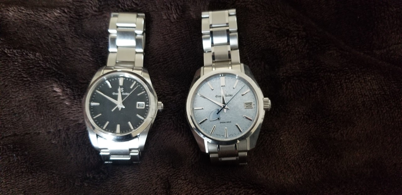 Seiko - Two Grand Seiko watches side by side, one is 37mm and purely quartz  and the other is a spring drive limited edition in 40mm,