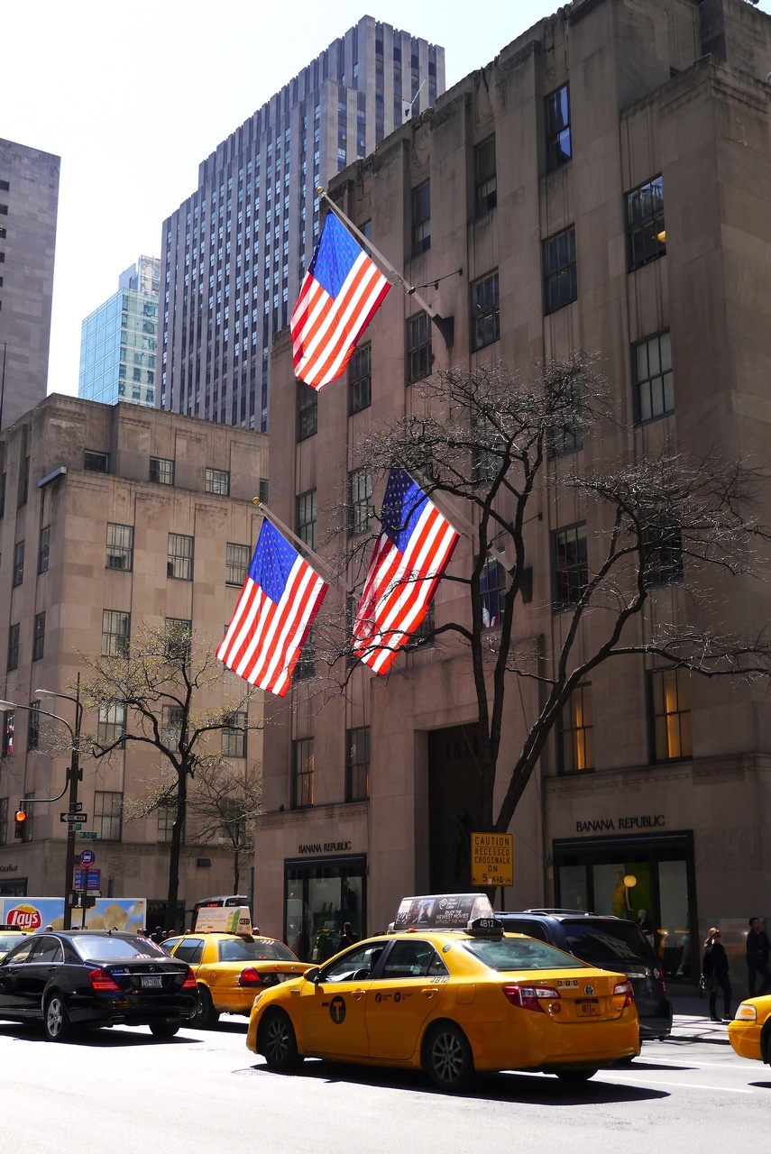 NY Symbols - Lots of Flags and Yellow cabs