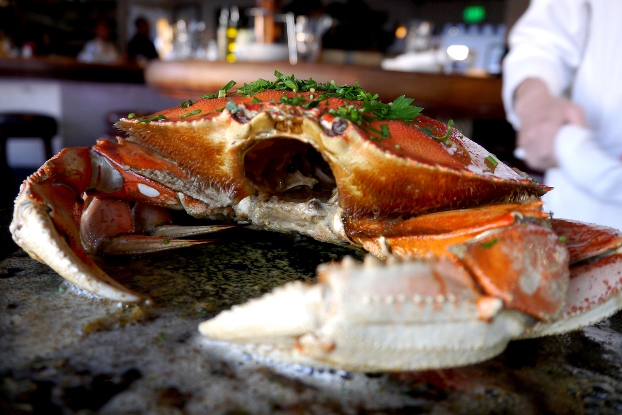 Dungeness Crab baked with buttery garlic sauce