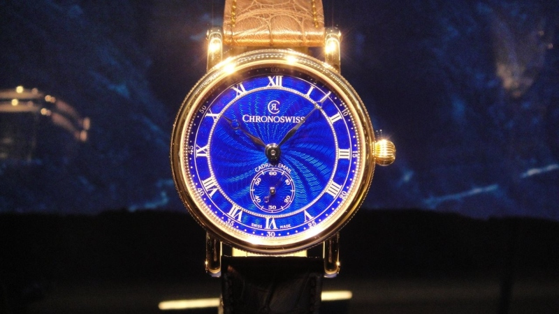 Chronoswiss transparent blue enamel on a guilloche dial