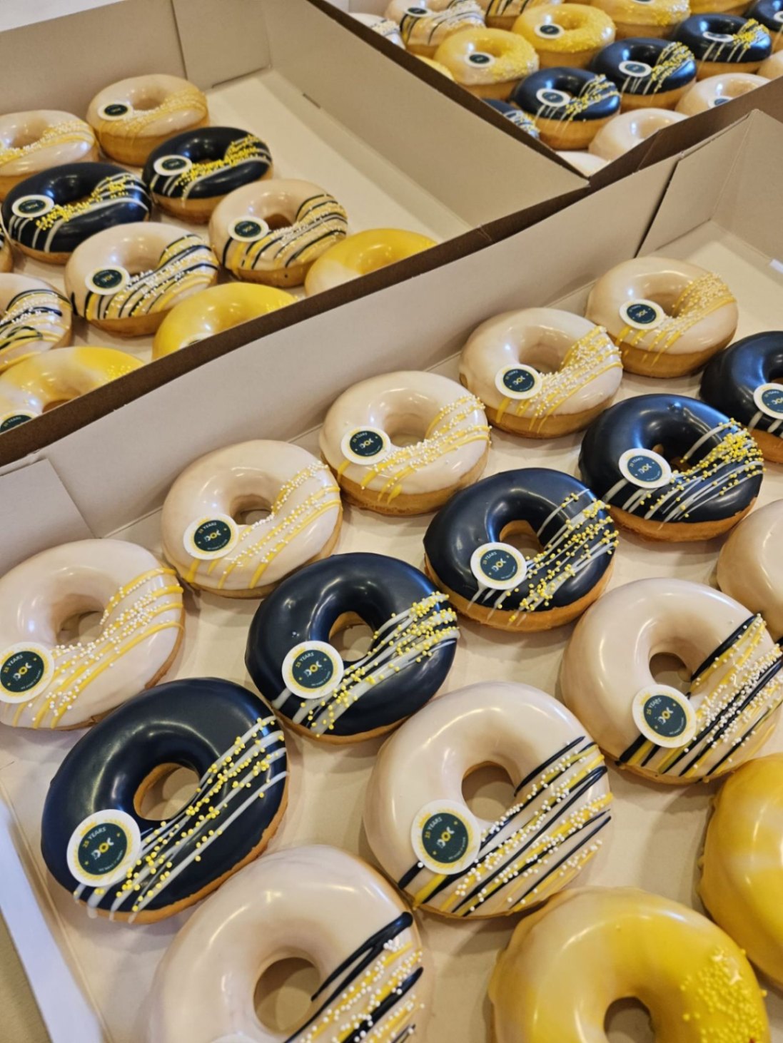 In honor of our 25th anniversary, delicious DO(C)nuts will be delivered to our customers today and tomorrow.