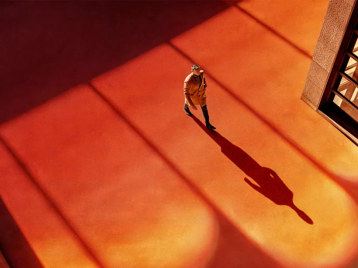An advisor walking towards an office
