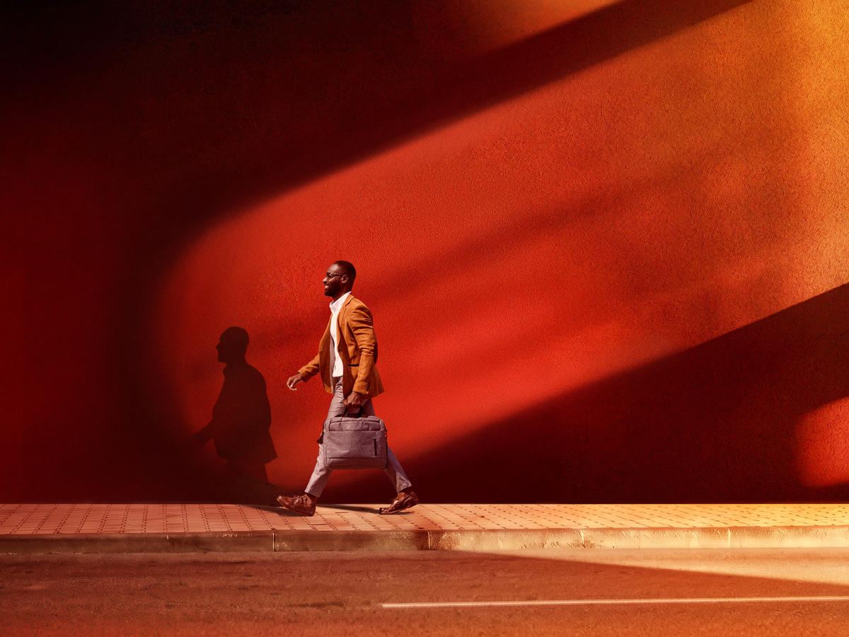 An advisor walking down the street