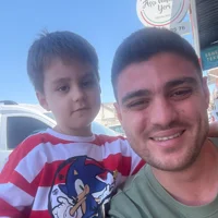 Ayhan C.