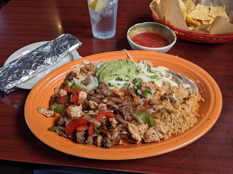 Chicken And Steak Fajitas at La Carreta Mexican Restaurant