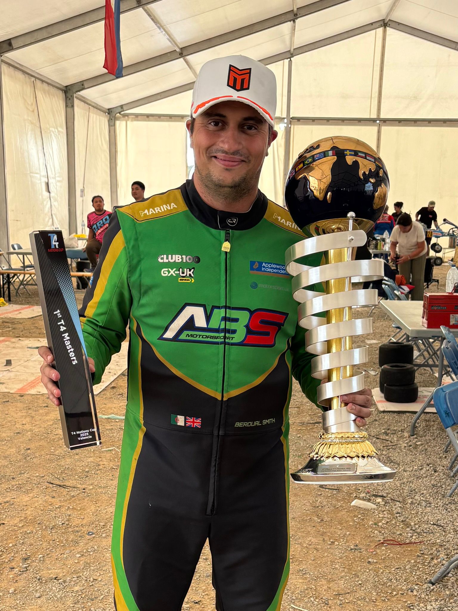Anwar Beroual-Smith holding the Tillotson T4 Senior 168 World Championship trophy