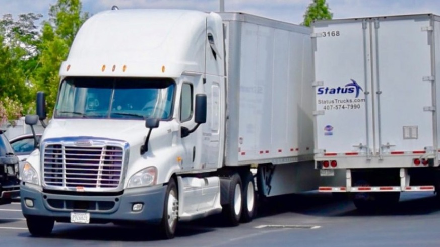 Status Transportation Corporation