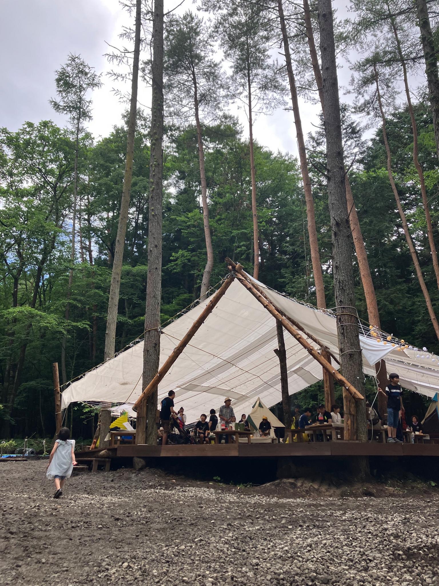 Our big outdoor tent on a wooden deck