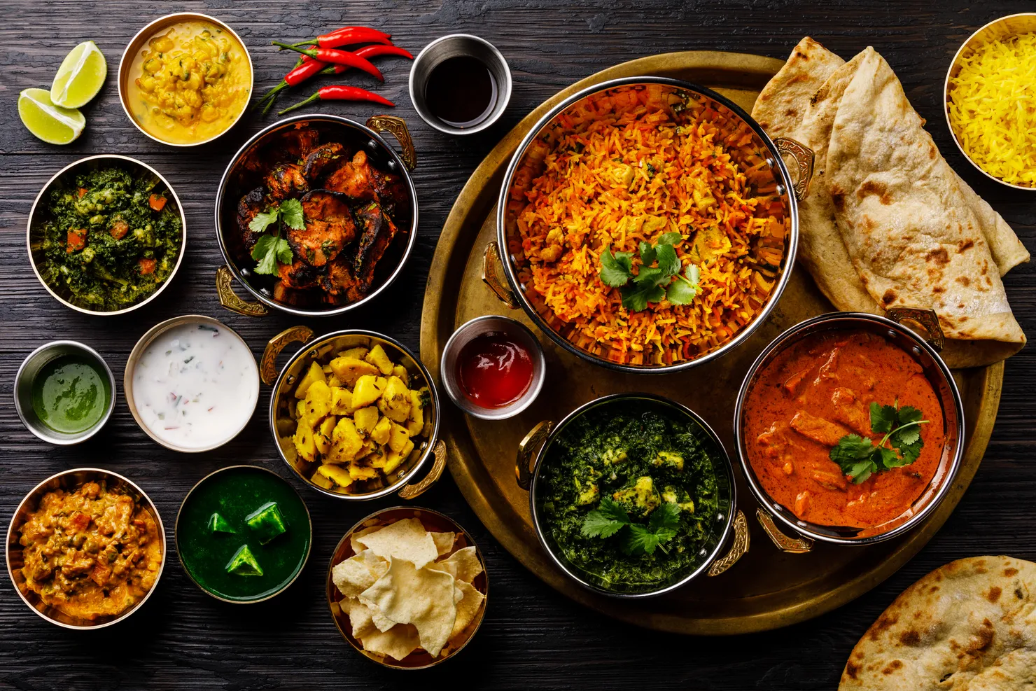 Indian food Curry butter chicken, Palak Paneer, Chiken Tikka, Biryani, Vegetable Curry, Papad, Dal, Palak Sabji, Jira Alu, Rice with Saffron
