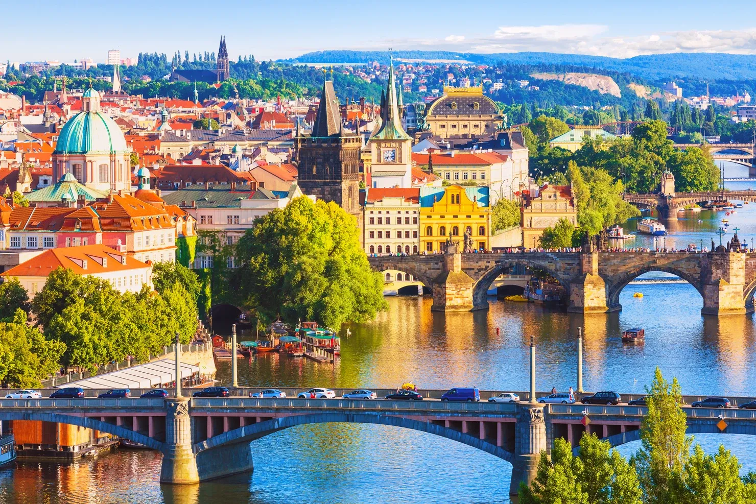 The Old Town pier architecture and Charles Bridge over Vltava river in Prague, Czech Republic