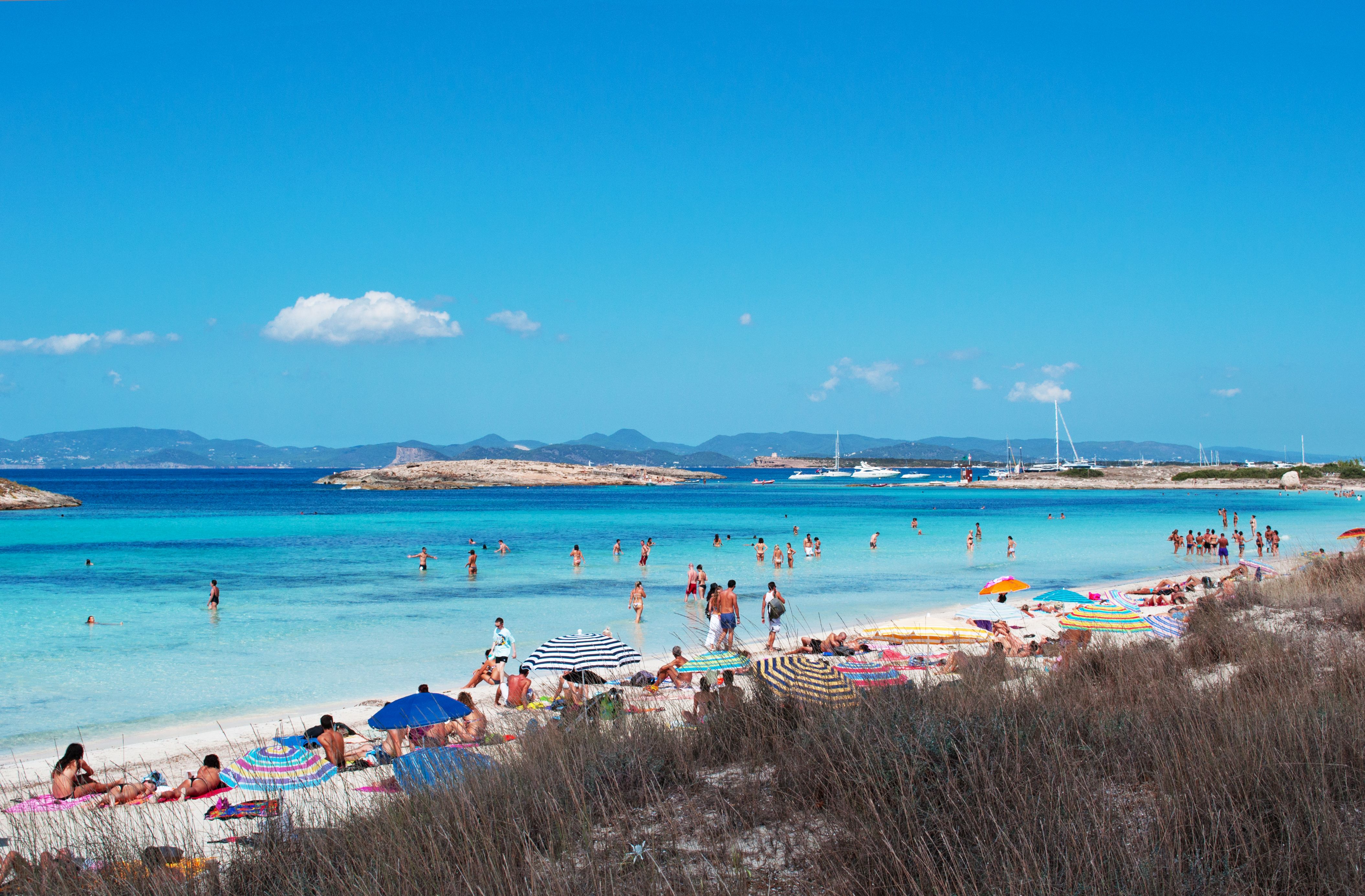 beach Playa de Ses Illetes with people 