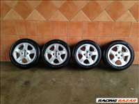 MAZDA 15" ALUFELNI 4X100 TÉLI 195/55R15 GUMIKKAL OLCSÓN!!!