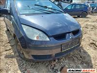 Mitsubishi Colt V jobb első fényszóró, bal első fényszóró 