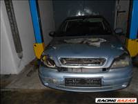 Opel ASTRA G Ferdehátú (F48_F08) 1.4 16V bal első spirálrugó