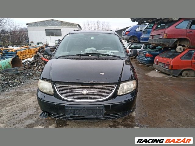 Chrysler Voyager (4th gen) Fényszóró Bal "129073" 1. kép