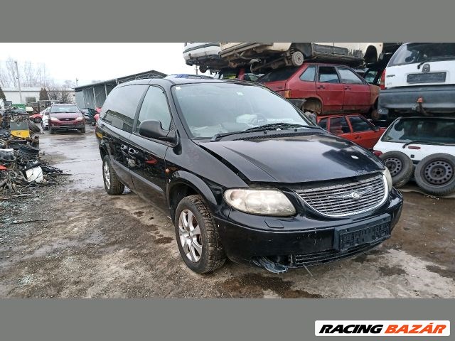 Chrysler Voyager (4th gen) Fényszóró Bal "129073" 3. kép