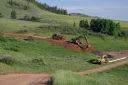 Big Huhnks Excavation, - logo