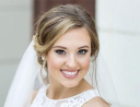 Tarrah Dawn & Merle Norman Cosmetics - logo