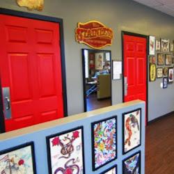 Stainlesstattoostudios - logo