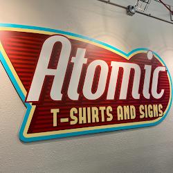 Atomictshirts - logo