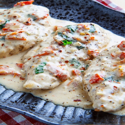 Pepper Flakes Chicken in a Creamy Parmesan and Sundried Tomato Sauce