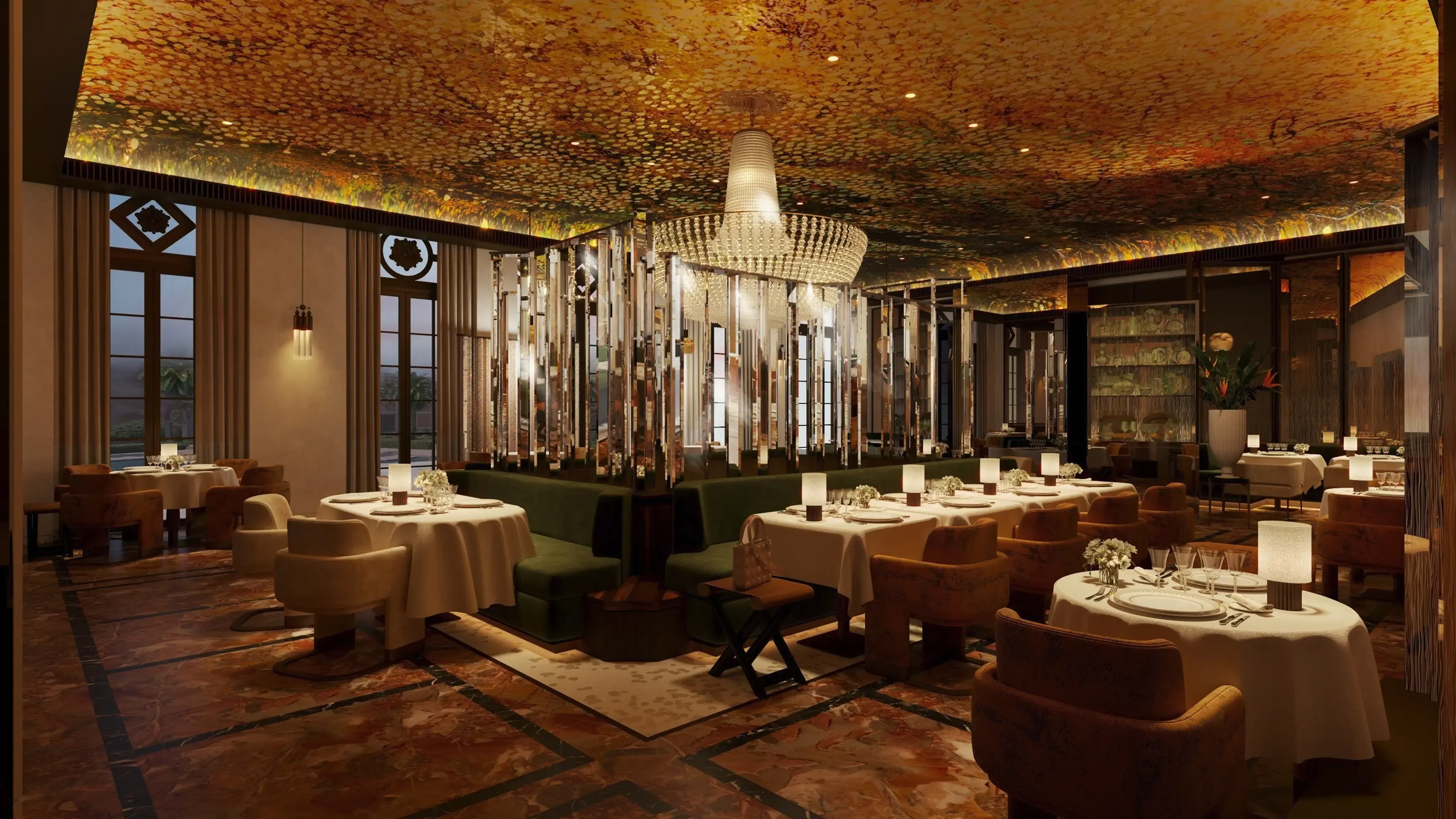 Elegant restaurant interior with a large crystal chandelier and luxurious golden textured ceiling.