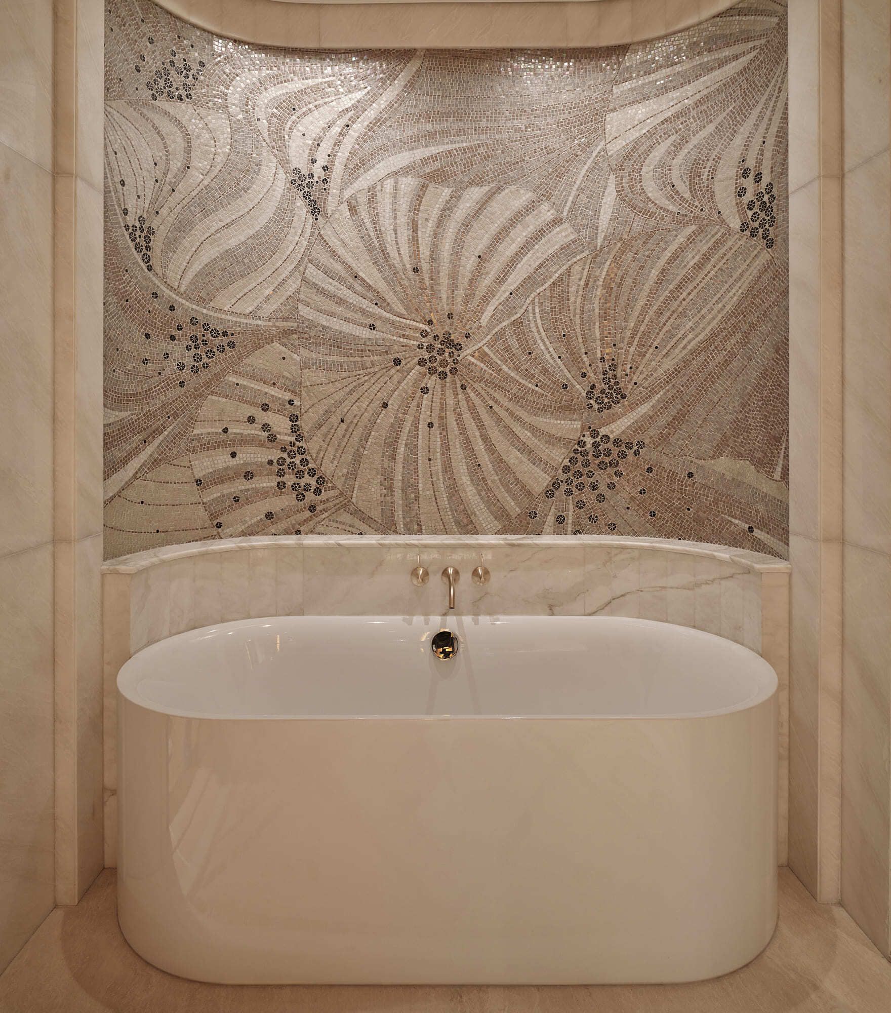 A long, white, cylindrical pendant light hangs in an elegant room with decorative wall panels.