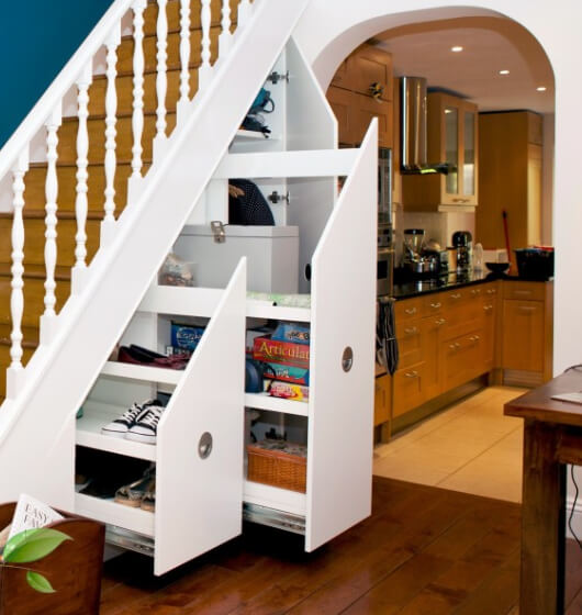 Under stairs storage ideas that use an awkward space effectively