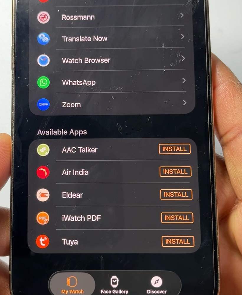 The Watch app on iPhone showing the Available Apps list, with an Install button next to AAC Talker, Air India, Eldear, iWatch PDF and Tuya