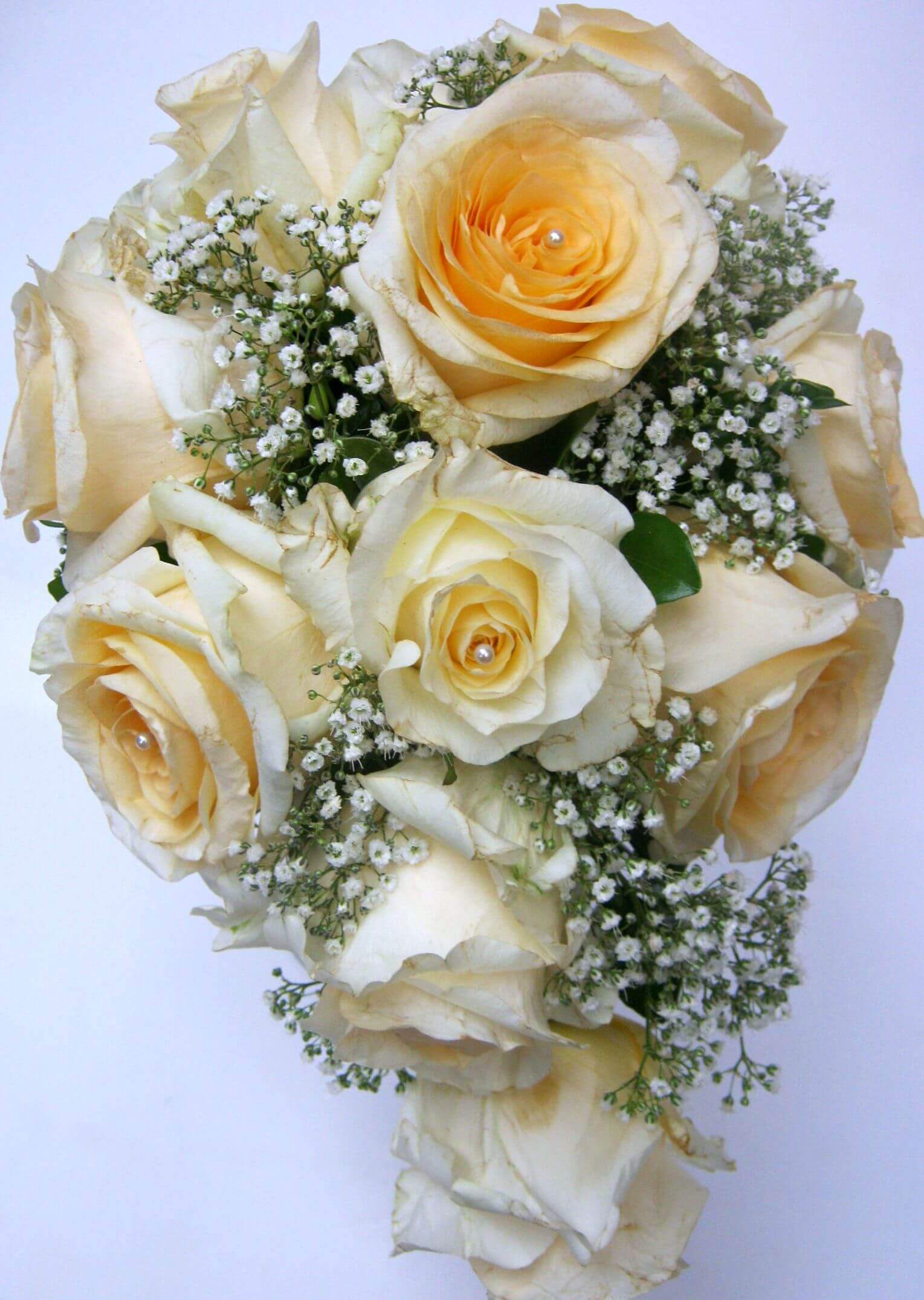 Cascading bridal bouquet 003 cream del la cream roses