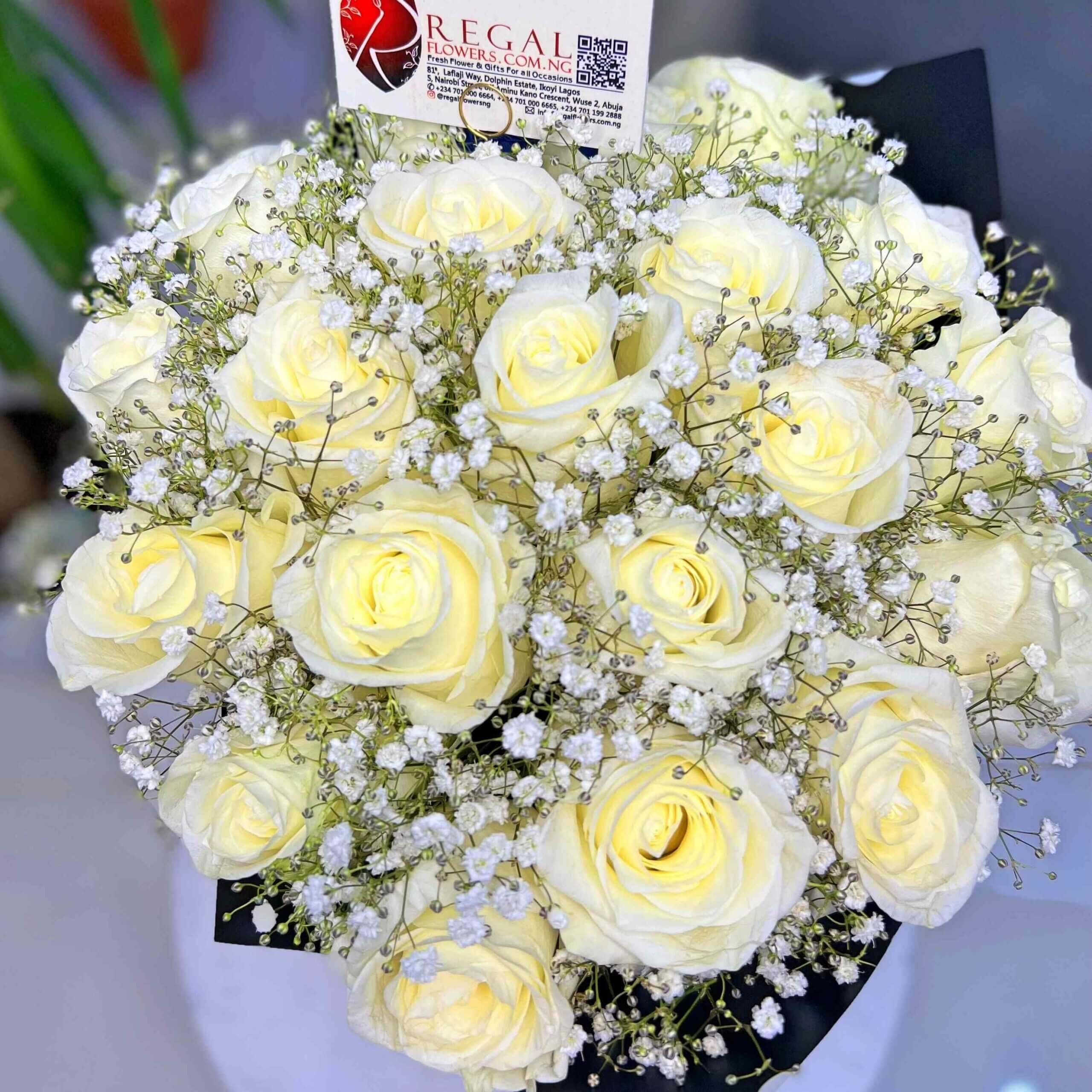 Regal Flowers White Roses and Million Stars_11zon