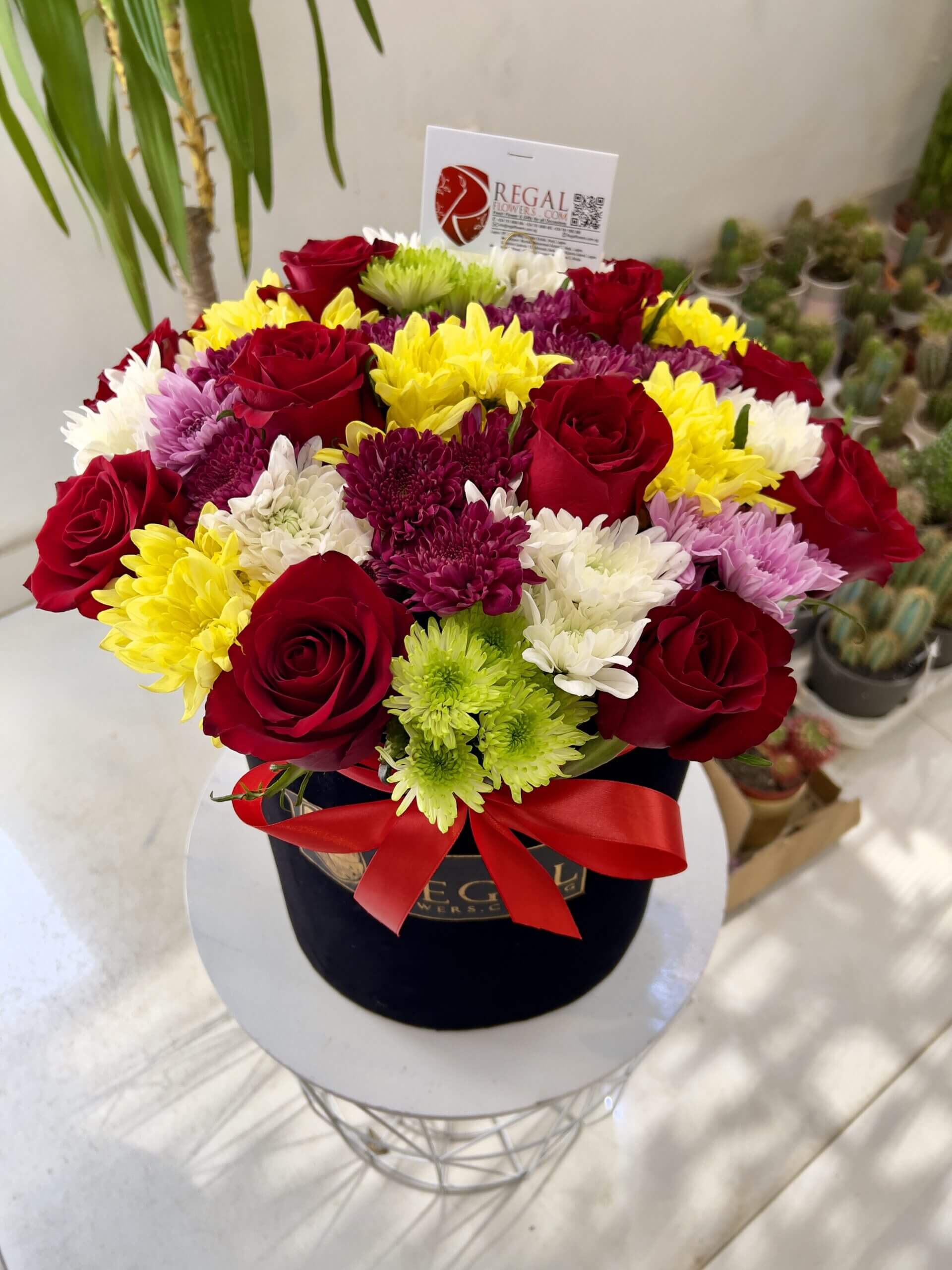 Mixed Chrysanthemums and Roses