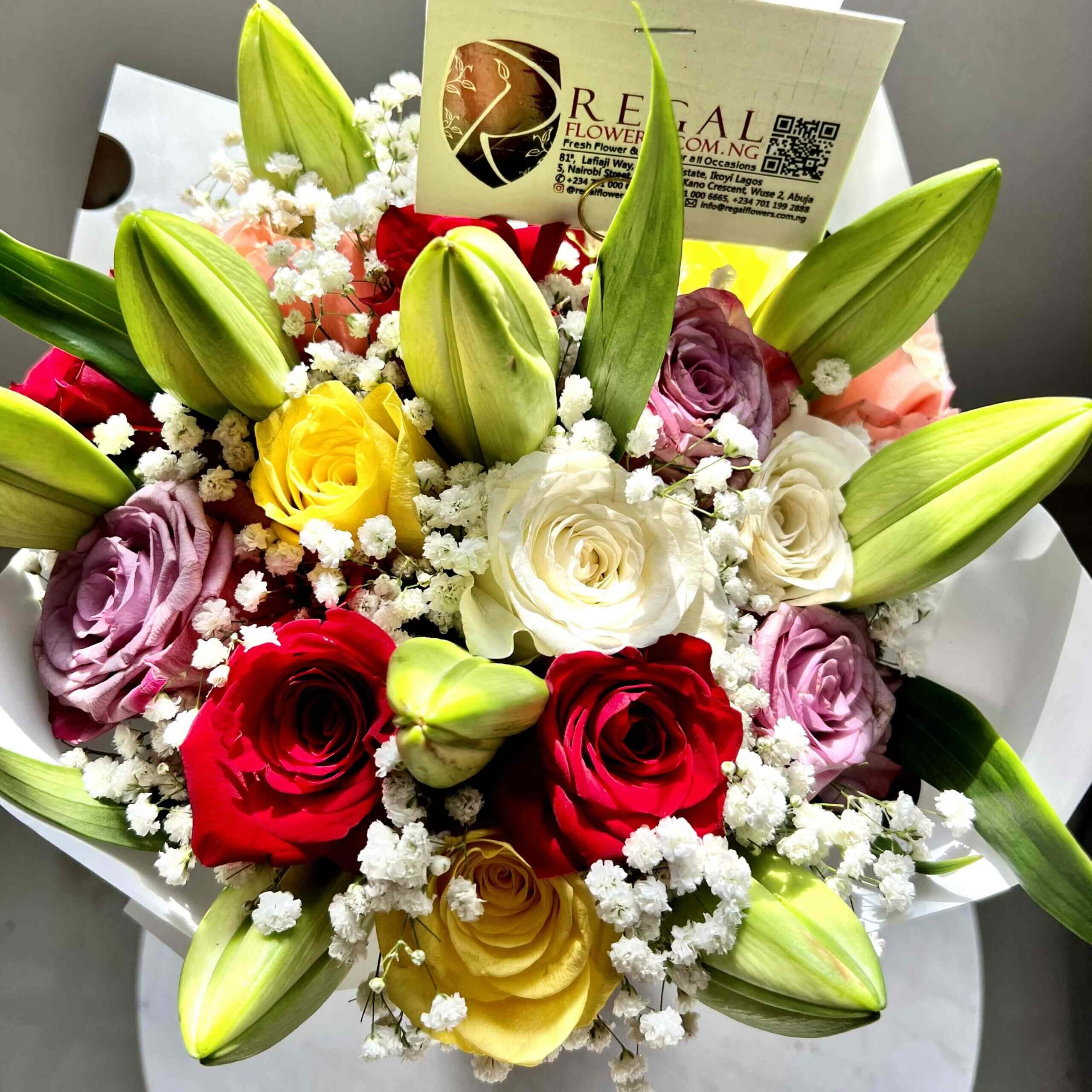 Regal Mixed Roses Lilies and Gypso_11zon