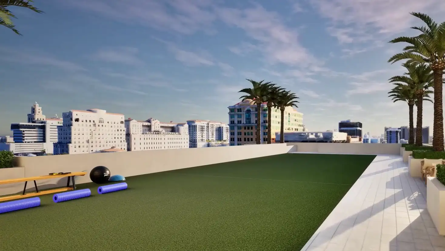 Yoga yard space on top of a building with synthetic grass and exercise equipment