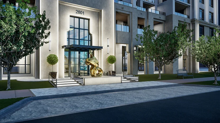 Nighttime view of the front entryway of Regency Parc featuring Power Tower, 2019, a sculpture by Lynda Benglis