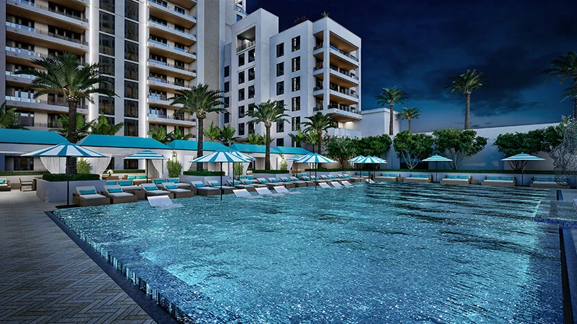 Nighttime view of Resort deck with pool at Regency Parc in Coral Gables