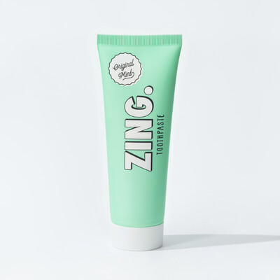 Logo of ZING. Enamel Whitening. Toothpaste, but magic.