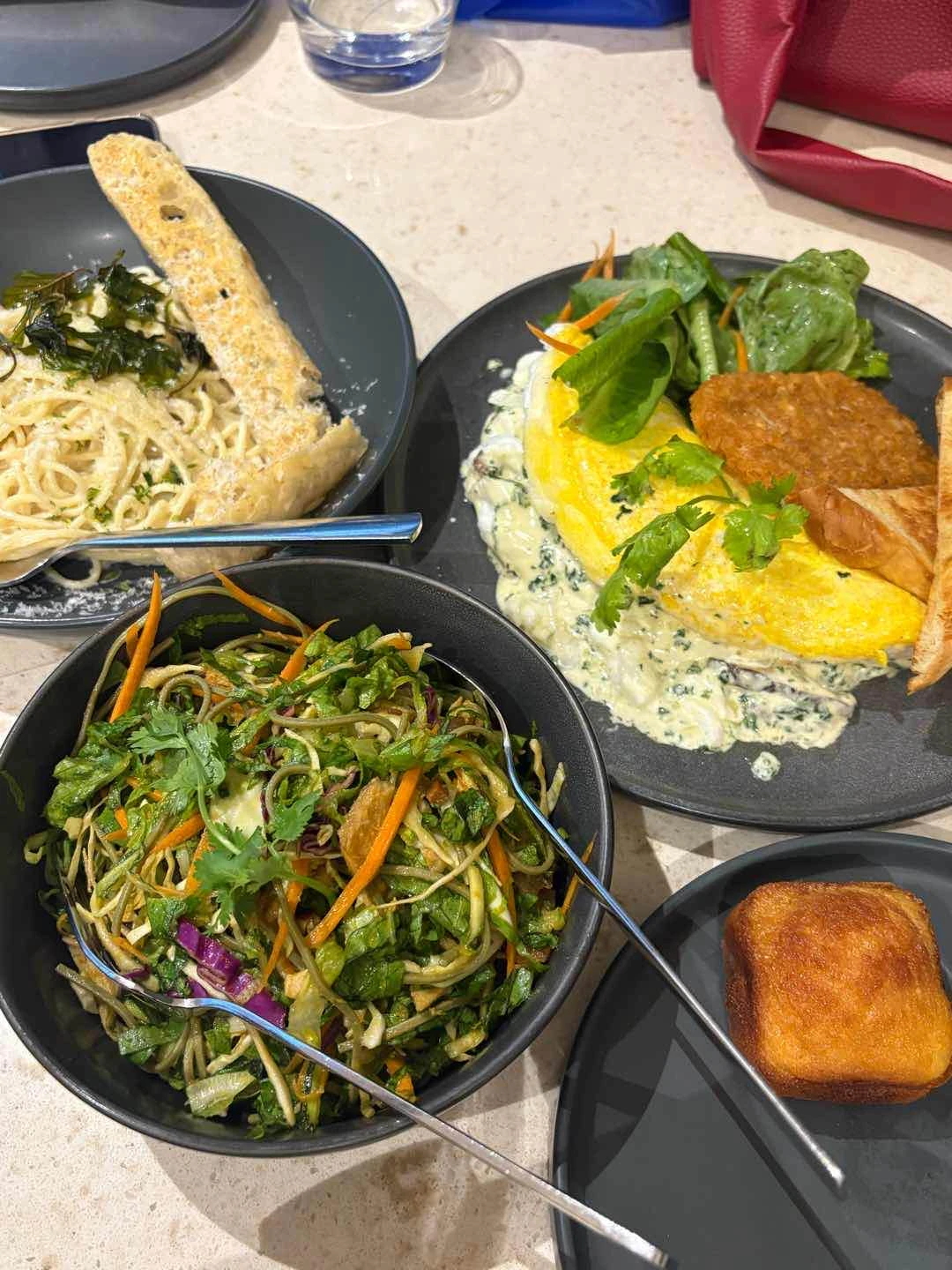 truffle pasta, spinach and mushroom omelette, pork and soba salad, cornbreaaad